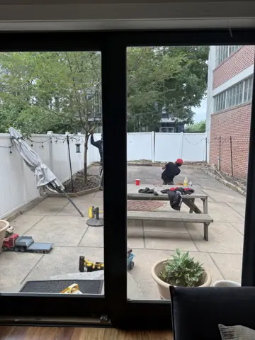 Back patio seen through new sliding glass doors