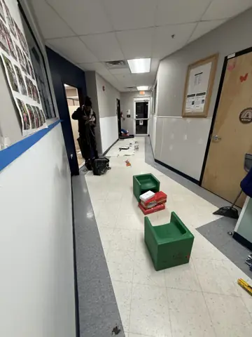 Commercial hallway renovation with new wall protection panels