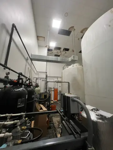 Commercial mechanical room during a build-out with new framing
