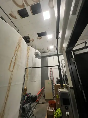 Commercial space build-out with tanks and new wall framing