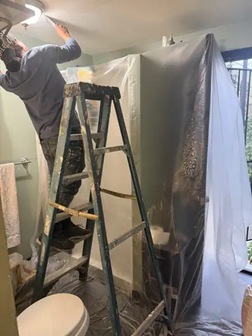 Covering a room in plastic before drywall and ceiling work