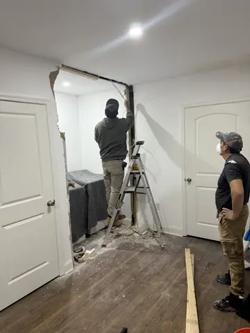 Framing a new interior doorway during a renovation
