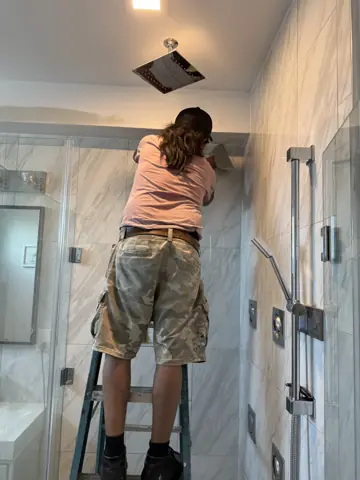 Installing a ceiling light in a newly tiled bathroom