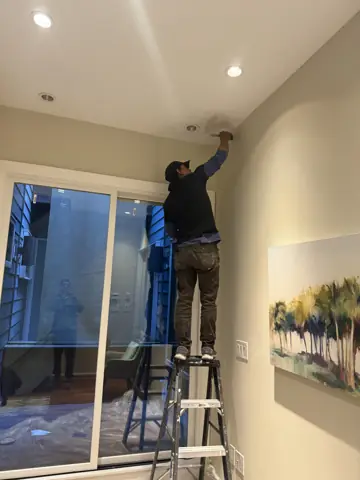 Mounting a ceiling fixture near sliding glass doors