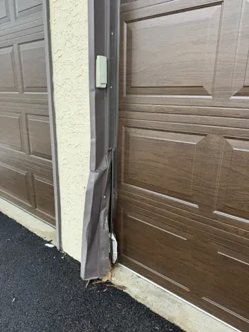 New brown garage door installed on a Philadelphia home