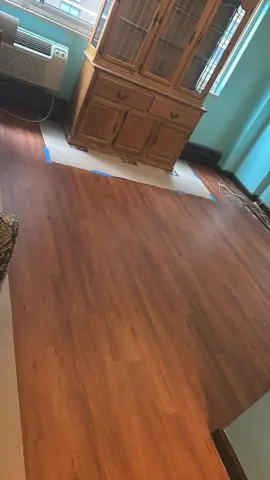 New flooring installed in a renovated room