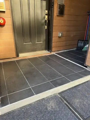 New tile entryway floor by a front door