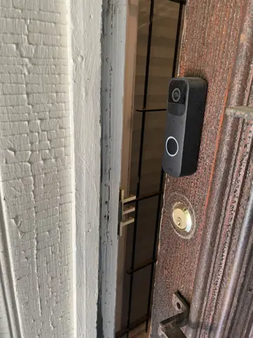 Video doorbell installed on the brick entry of a Philadelphia home